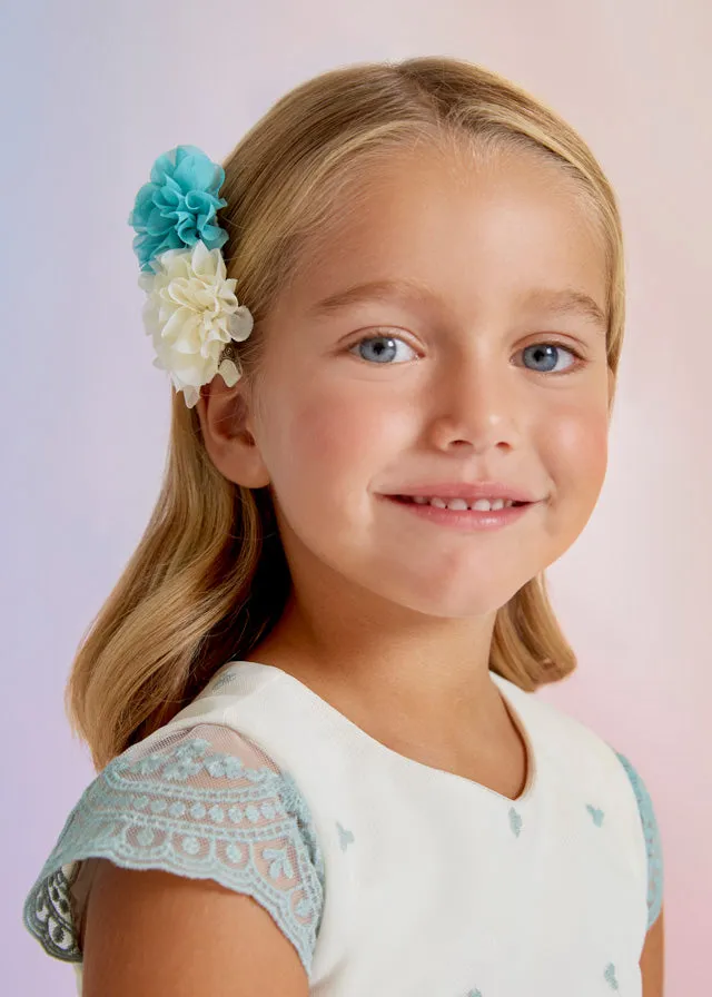 Girl with flower hair accessories