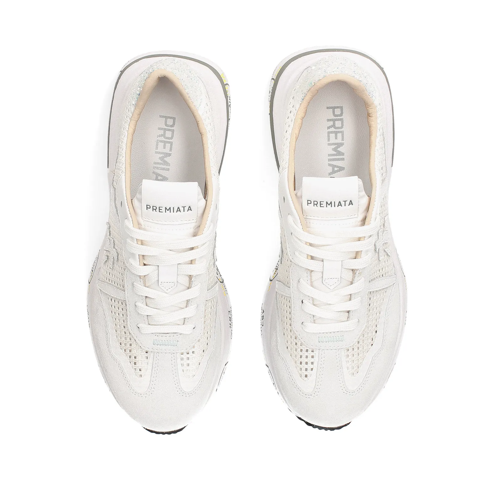 White mesh and suede Cassie sneakers.