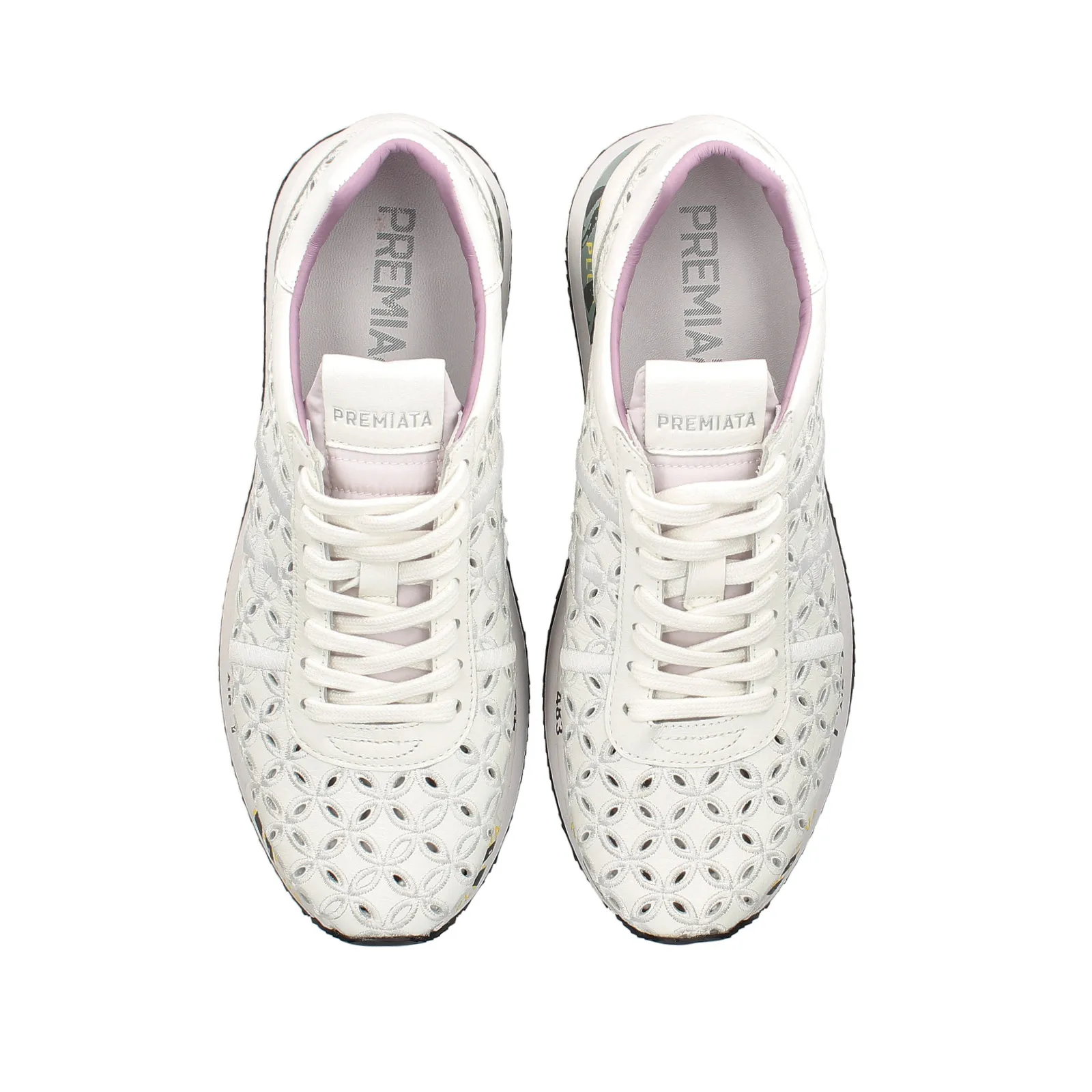 White leather perforated sneakers Conny.